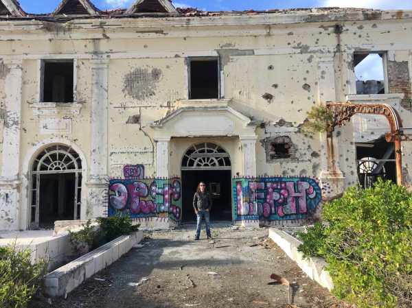 Mike outside one of the abandoned hotels