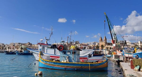 Colourful boat in Marsaxlokk harbour