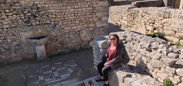 Me at the old latrine, they even had a sink. Some mosaic is still on the ground