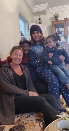 Me, Karim, his wife and their daughter in their living room